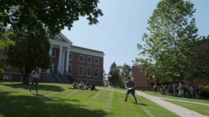 College Students Playing Frisbee at Castleton State University