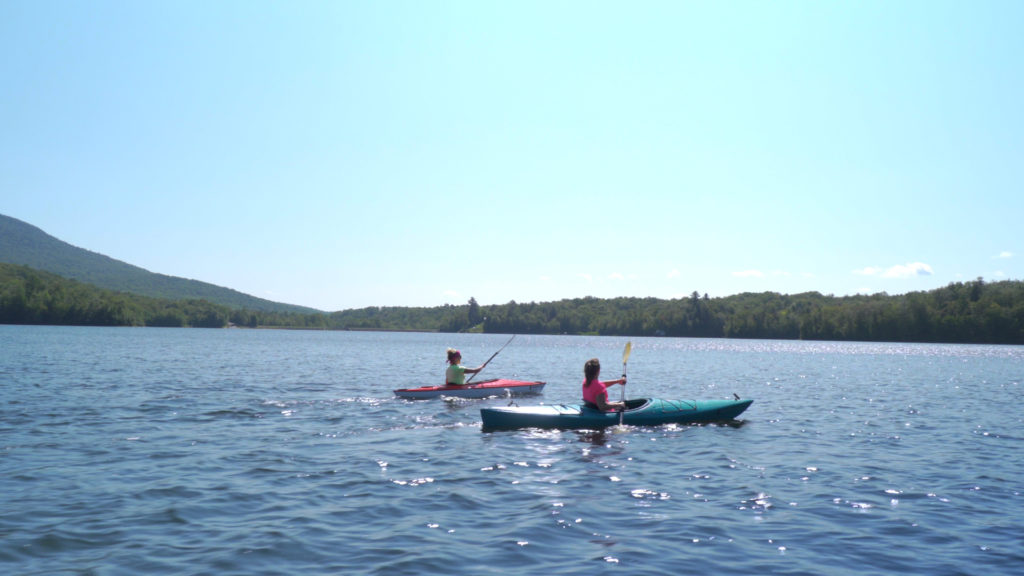 Chittenden frame Two Women Kayaking in Chittenden Vermont