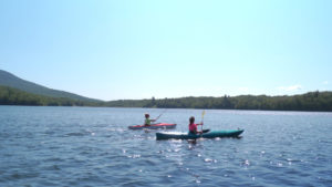 Two Women Kayaking in Chittenden Vermont
