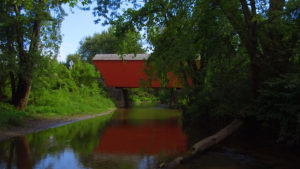 Red Covered Bridge over Otter Creek in Pittsford Vermont