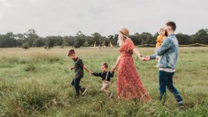 Picture of family walking in field